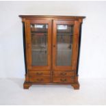 A Victorian glazed display cabinet with four drawers under, length 102cm, height 129cm.