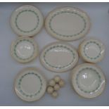 A hand painted part dinner service by Gray's Pottery comprising dinner plates, side plates, bowls,