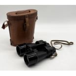 A pair of Ross of London Bino. Prism No5 MkII x7 military binoculars dated 1938 with broad arrow