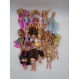 A collection of unboxed Barbie and Bratz dolls, along with a selection of accessories including