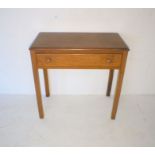 An oak side table with single drawer, length 78cm, height 77cm.