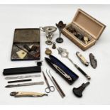 A collection of items including vintage razors, sovereign case, silver plated pieces, boxed