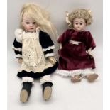 Two antique bisque headed dolls including one marked 1894 for Armand Marseille and another similar