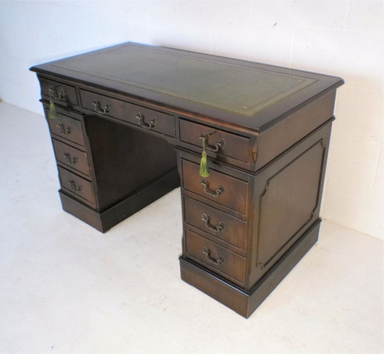 A reproduction mahogany kneehole desk, with green leather inset top, length 121cm, depth 61cm, - Image 3 of 6