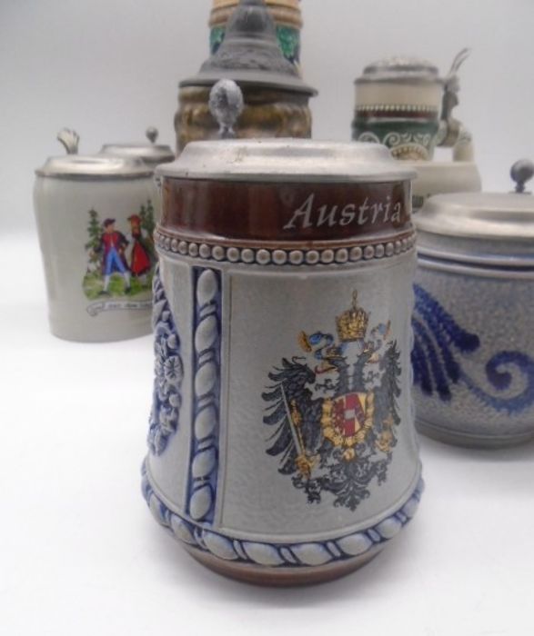 A collection of twelve Steins. - Image 8 of 21