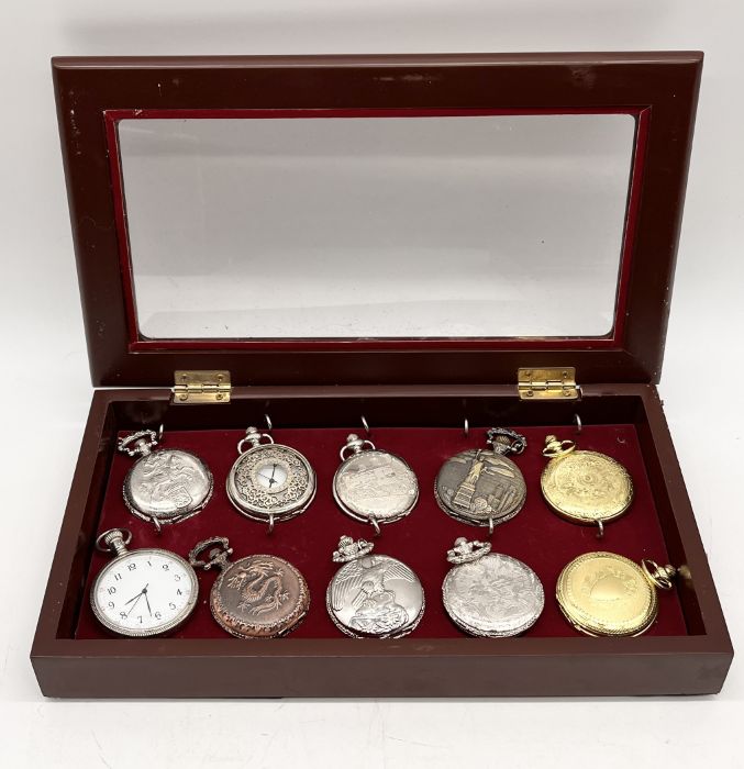 A collection of 10 modern pocket watches in display case