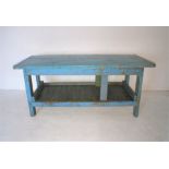 A large blue painted pine workbench, length 205cm, width 78cm, height 92cm.