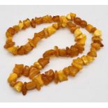 A butterscotch amber necklace, weight 58.5g