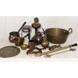 A collection of brassware and copper including Eastern brass plate decorated with Buddha figures,