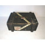 A vintage wooden trunk, the top named to 'Mr H. B. Barns, RN' (Royal Navy).
