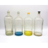 Four antique glass poison bottles.