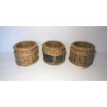 Three wicker baskets.