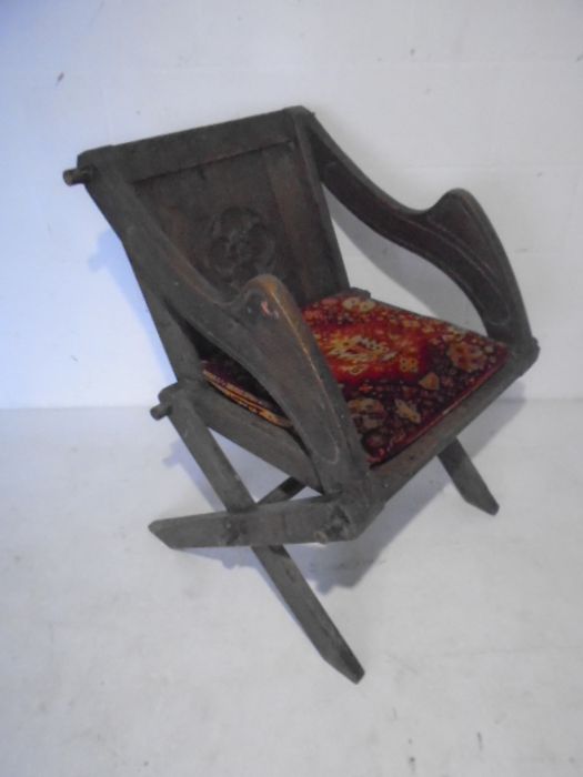 A Gothic style oak Glastonbury chair