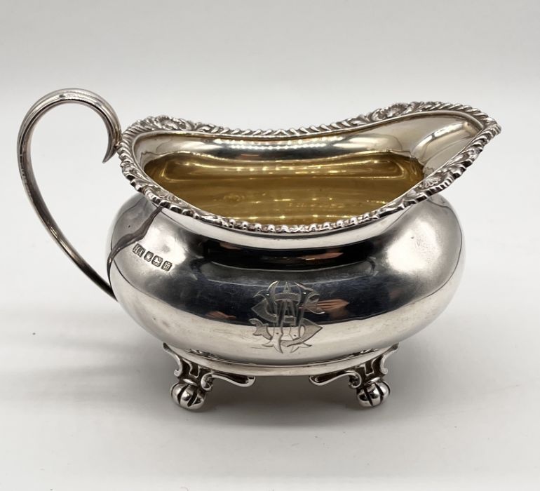 A hallmarked silver three piece tea set, Sheffield 1914, total weight 1129g (36.3 troy ounces) - Image 4 of 5