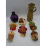 A collection of Bosson plaster wall mounted busts (A/F) along with a studio pottery jug and a