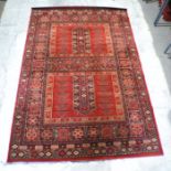 A large red ground rug, 289cm x 200cm.