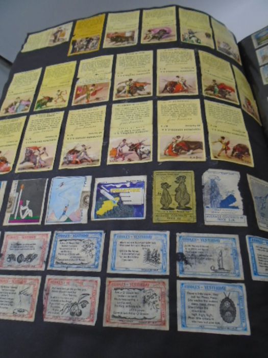 A large collection of vintage matchbox covers, an album and a box of loose. - Image 13 of 46