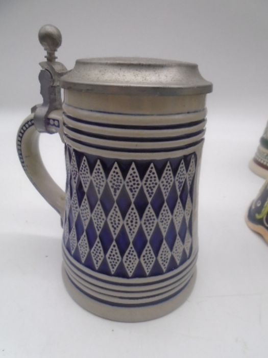 A collection of twelve Steins. - Image 21 of 21
