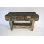 A weathered workbench, A/F, length 137cm, depth 49cm, height 80cm.