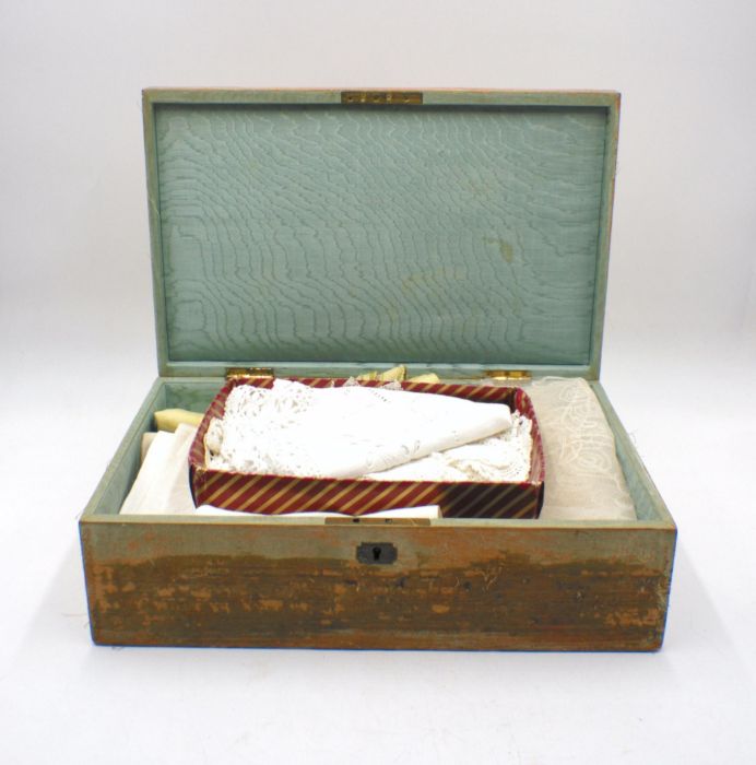 An antique sewing box with embroidered top, containing a quantity of lace and fabrics etc, A/F. - Image 4 of 4