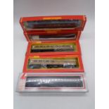 A collection of five boxed OO gauge carriages including two Tri-ang Hornby LNER brake 3rd coaches,