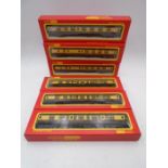 A collection of six boxed Hornby Railways OO gauge Great Western carriages including four