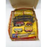 A Met Toy Railways Mechanical Freight Train Set comprising of a locomotive, tender, wagons,