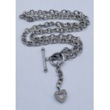 A 9ct white gold necklace with heart shaped pendant set with diamonds, total weight 4.3g