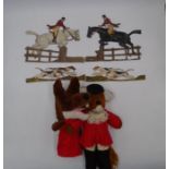 A collection of vintage hunting memorabilia including hand puppets, a cuddly huntsman fox and four