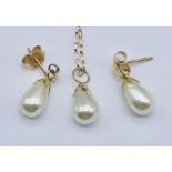 A pearl set consisting of earrings and pendant on fine chain, all 9ct gold
