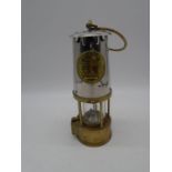 A brass and steel Eccles (Manchester) type 6 miner's lamp