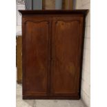 A Victorian mahogany two door wardrobe