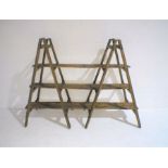 A set of shop display trestle shelves.