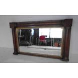 A Victorian over mantle mirror with bevelled glass.