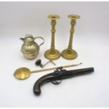A replica flintlock pistol along with a pair of brass candlesticks, jug etc.