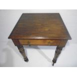 A Victorian oak side table