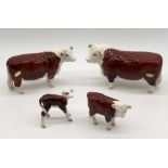A Beswick model of a Hereford bull "Ch. Of Champions", Hereford cow "Ch. of Champions" and two