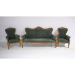 A French settee and matching armchairs with button-back detailing.