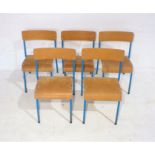 Five metal framed children's school chairs.