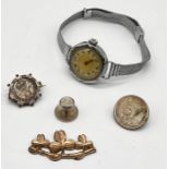 A vintage Lanco ladies watch, silver stud, Victorian Threepenny bit brooch etc.