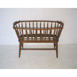 A French crib, with bobbin turned supports, length 107cm, height 80cm.