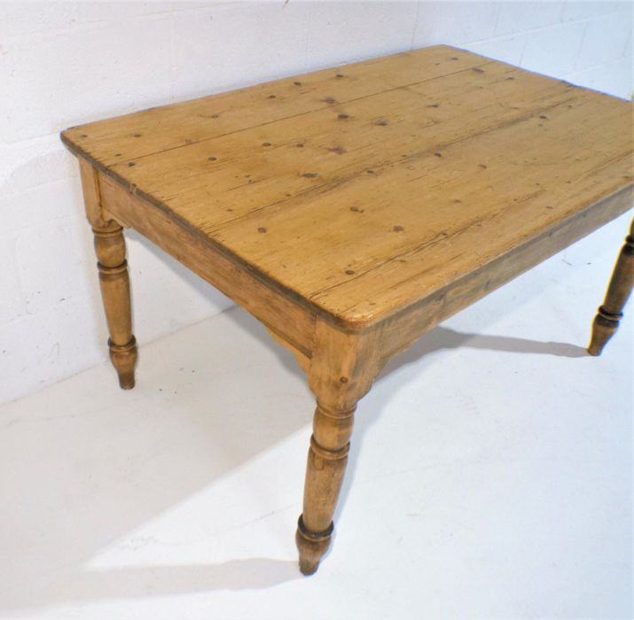 A pine farmhouse table with single drawer, length 138cm, width 86cm, height 73cm. - Image 6 of 7