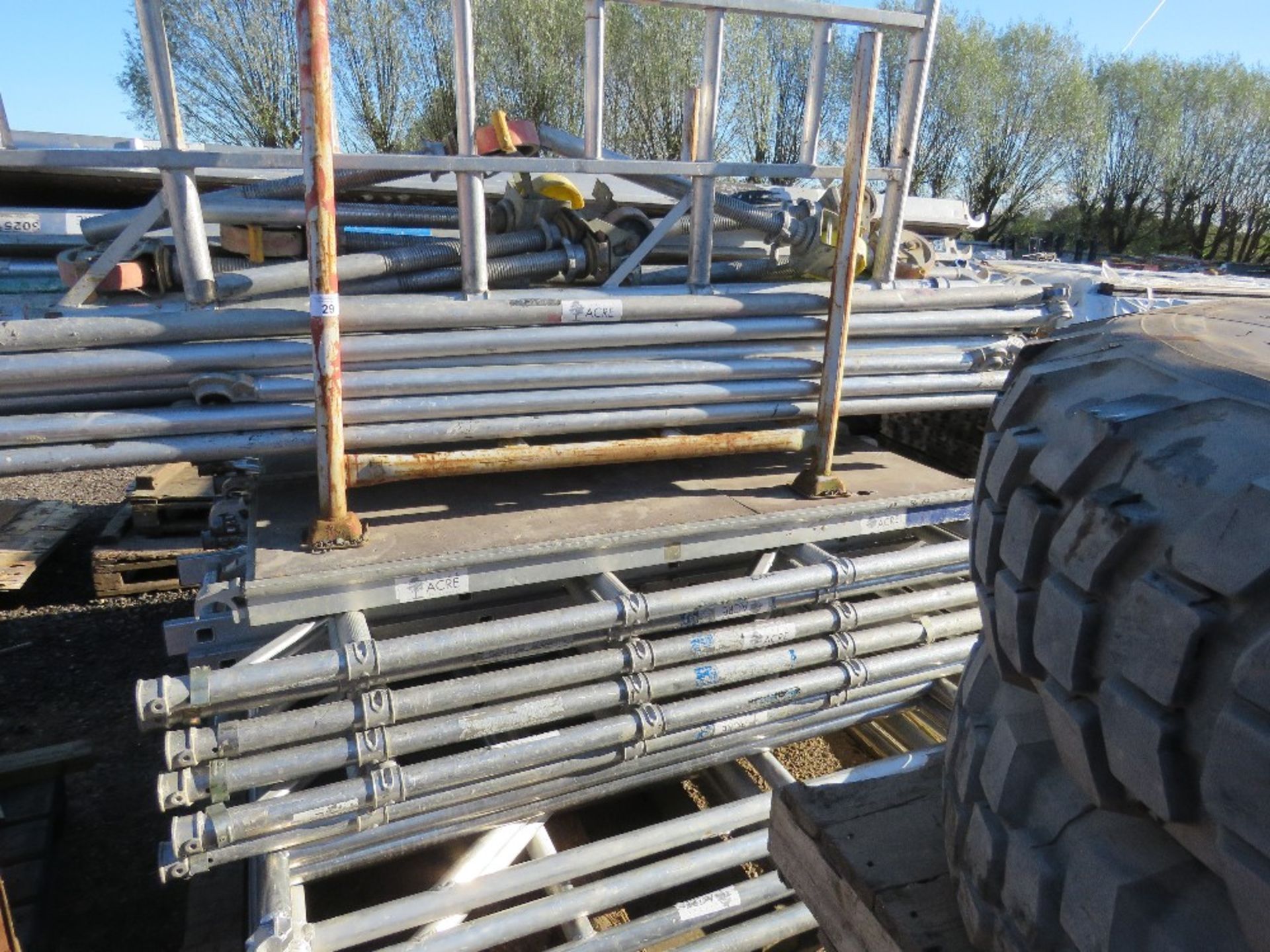 LARGE QUANTITY OF ALUMINIUM SCAFFOLD TOWER PARTS, INCLUDING FRAMES, POLES AND DECKS.