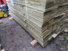 LARGE PACK OF PRESSURE TREATED FEATHER EDGE TIMBER FENCE CLADDING BOARDS. SIZE: 1.80M LENGTH X 1