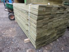 LARGE PACK OF PRESSURE TREATED FEATHER EDGE TIMBER FENCE CLADDING BOARDS. SIZE: 1.65M LENGTH X 1