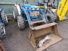 FORD 1520 4WD COMPACT TRACTOR WITH FOREND LOADER. 4 IN 1 FRONT BUCKET. AND A ROLL BAR (NOT FITTED) W