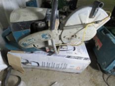 MAKITA PETROL SAW PLUS A WET CUT BOTTLE. EXECUTOR SALE. SOLD UNDER THE AUCTIONEERS MARGIN SCHEME THE