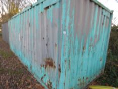 GREEN/GREY METAL SITE STORE WITH KEY. THIS LOT IS SOLD UNDER THE AUCTIONEERS MARGIN SCHEME, THEREFO