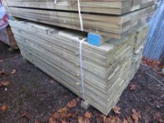 LARGE PACK OF TREATED FEATHER EDGE FENCE CLADDING TIMBER BOARDS. SIZE: 1.80M LENGTH X 100MM WIDTH AP