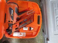 PASLODE 90I NAIL GUN IN A CASE.